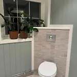 Huset I Den Lykkelige Gaten