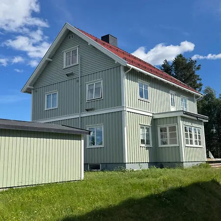 Huset I Den Lykkelige Gaten
